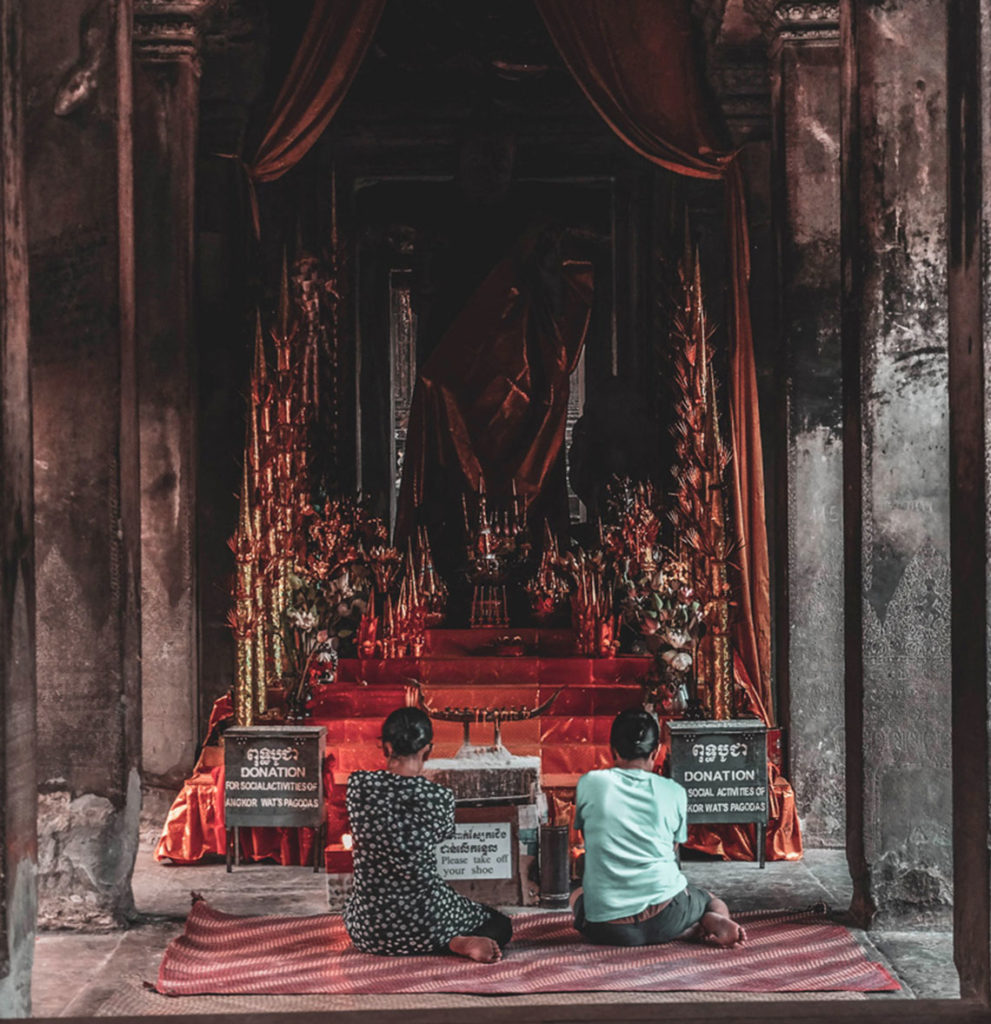Thai people praying in temple